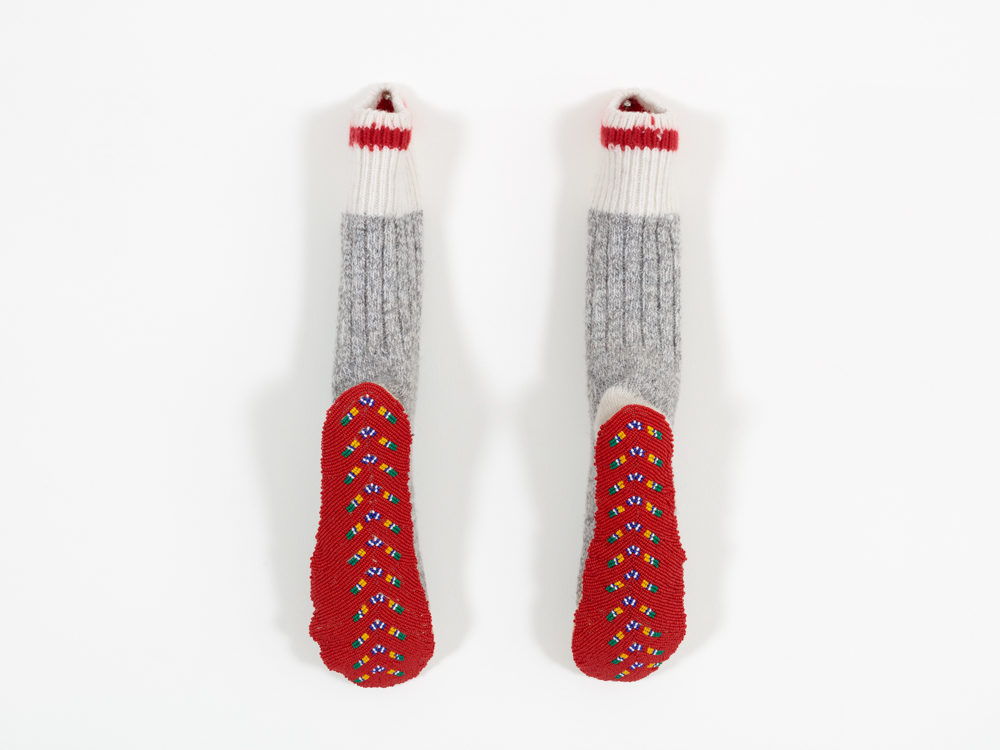a pair of socks: fiddle & sash 2018 Audie Murray glass beads, tanned hide and wool socks
